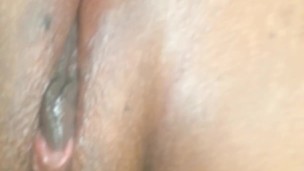 Ebony girl plays with her pretty pussy