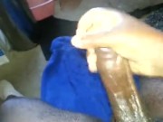 stroking it with oil