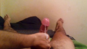 big oiled up cock stroked firm and slow till squirting orgasm