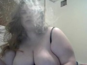 Huge DDD tit wife smokes while playing with her big tits and hard nipples