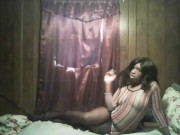 sexy black girl smoking in see through dress