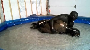 Wet gasmasked Orca frogman humps and struggles with another frogman
