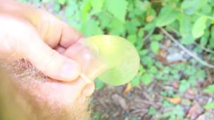 Hairy Guy Pees in a Condom, and makes a mess