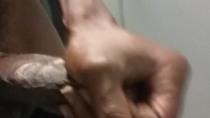 At work playing with my big black dick