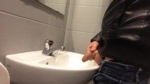 Dirty boy Pissing in public sink