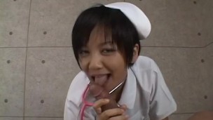 Asian nurse is sucking and titty fucking the cock