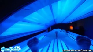 teen latina gets caught rubbing her clit while using a tanning bed