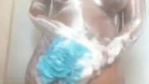 ebony pays with herself in shower