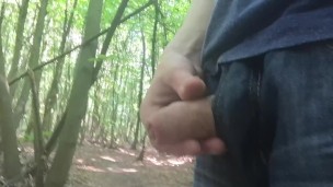 taking a piss in the woods