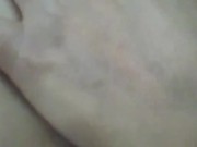 Young babe plays with wet pussy
