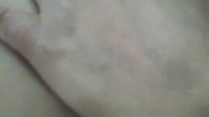 Young babe plays with wet pussy