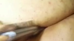 BBW fucking her ass with a hairbrush