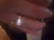 Rubbing my clit with my wand while riding my dildo.