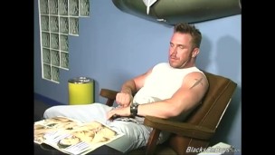 Muscular white guy makes love with a black man