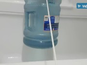 Hanging water jug off my balls
