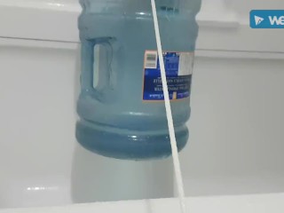Hanging water jug off my balls