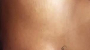 Massaging big natural ebony tits
