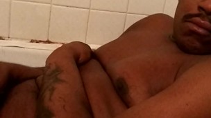 In the tub about to cum
