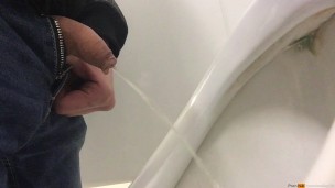 A quick pee in the urinal