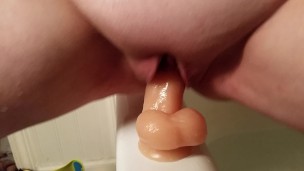 Fucking my suction cup dildo in the bathtub part 2