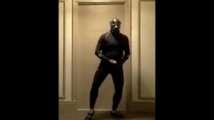 masked bicyclist jerking off in hotel hall