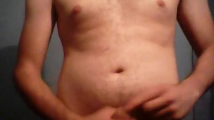 boy jerks off and cums on camera
