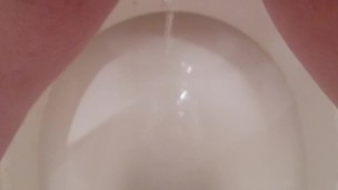 Hairy pussy piss and mastrubating on public toilet
