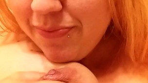 Wife licking her milky tits