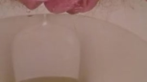 Playing with my hairy pussy while pissing on the toilet