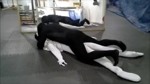 black meshed frogman vs white spandex and spiderman dummy