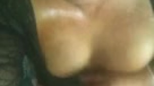 tranny oils up her tits