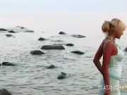 After she gets completely wet she will get naked for your eyes