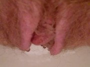 Powerful short piss from hairy (gingery) pussy
