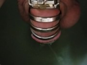 Man peeing sitting locked in chastity cage!