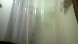 POV - Guy is playing with his flashlight in the shower