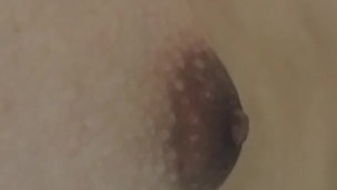 Asian Girl rubbing nipple