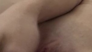 Asian girl playing with glass dildo for the first time
