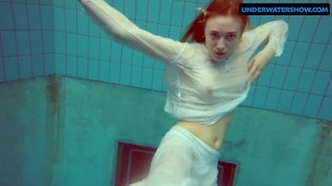 Redhead Diana hot and horny in a white dress