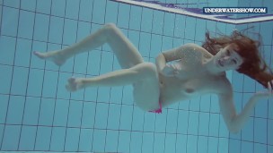 Wet teen Lera in the pool