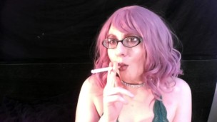 Coco smoking with pink hair and glasses