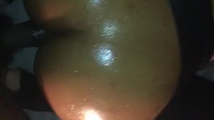 Bubble butt oiled up in stockings