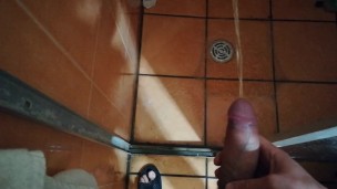 Guy peeing with boner