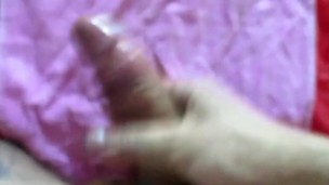 Oiled Cock Stroking Cumshot