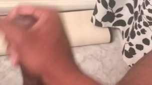 Stroking cock in the bathroom