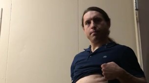 Horny Stud Masturbates to Relieve Tension in Restroom
