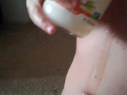 Pouring coconut oil on my body 1/16