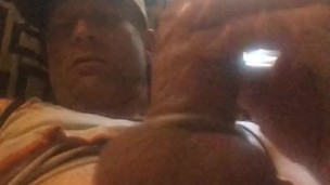 Stroking wearing cockrings.