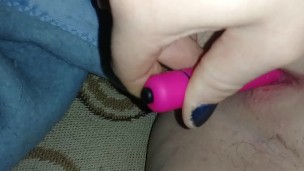 Masturbating