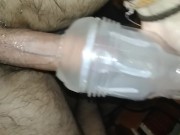 Hairy guy fucks fleshlight and creampies it