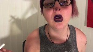 Suicide Girl Smokes and Plays With Big Tits